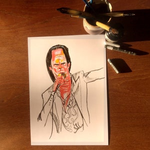 May include: A black and white drawing of a person singing into a microphone. The person has long dark hair and is wearing a suit jacket. The drawing is done in a loose, expressive style.