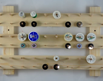 display 30 reels and 30 cans. MADE TO ORDER