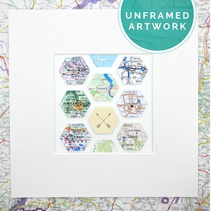 May include: Unframed artwork featuring a honeycomb design with maps of different cities, including Madison, Portland, Columbus, Dallas, and Orlando. The artwork is on a white background with a brown arrow design in the center.