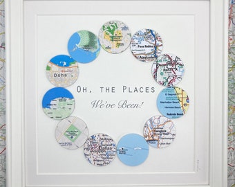 World travel map printed with 11 map circles, framed wall art. Personalised, memorable world travel or life story gift.