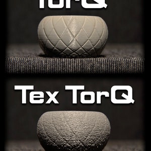 May include: Two grey curling stones, one with a smooth surface and the other with a textured surface. The stones are labelled "TorQ" and "Tex TorQ".