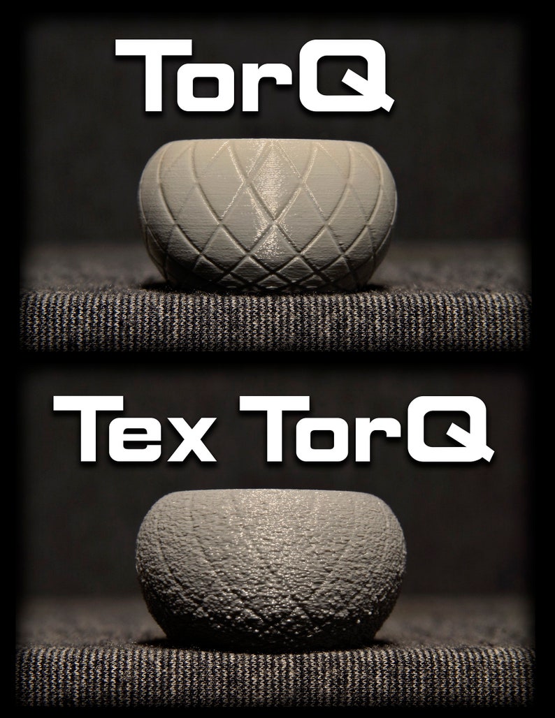 May include: Two grey curling stones, one with a smooth surface and the other with a textured surface. The stones are labelled "TorQ" and "Tex TorQ".
