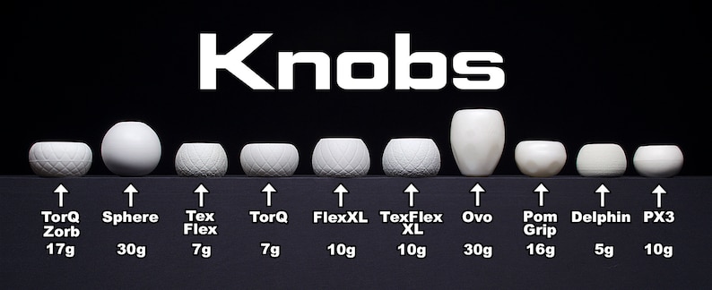 May include: Ten different white ceramic knobs with various shapes and textures. The knobs are labelled with their names and weights in grams. The names include TorQ Zorb, Sphere, Tex Flex, TorQ, FlexXL, TexFlex XL, Ovo, Pom Grip, Delphin, and PX3.