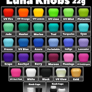 May include: A selection of Luna Knobs in a range of colours, such as red, orange, yellow, green, blue, purple, pink, white, black, and gold. Each knob is labelled with its colour name. The image also shows different styles of knob caps.