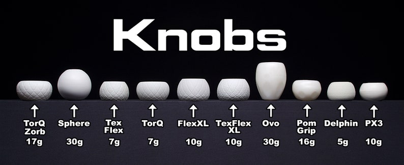 May include: Ten different white ceramic knobs with various shapes and textures. The knobs are labelled with their names and weights in grams. The names include TorQ Zorb, Sphere, Tex Flex, TorQ, FlexXL, TexFlex XL, Ovo, Pom Grip, Delphin, and PX3.