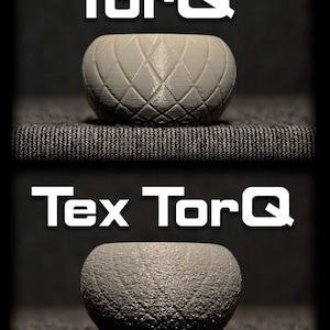 May include: Two grey curling stones, one with a smooth surface and the other with a textured surface. The stones are labelled "TorQ" and "Tex TorQ".