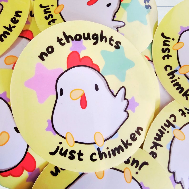 May include: A set of yellow round stickers with a white chicken illustration and the text "no thoughts just chimken" in black. The chicken has a red comb and a pink star is behind it.