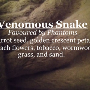 Venomous Snake fragrance, favoured by Phantoms carrot seed, labdanum, peach, tobacco, wormwood, grass, sand image 1