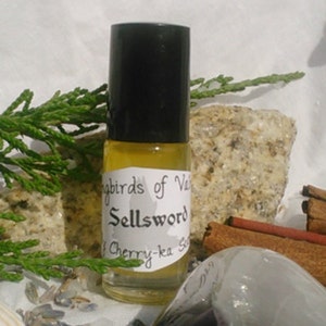 Sellsword, a Songbirds of Valnon fragrance (Tobacco, leather, earth, steel, cypress)