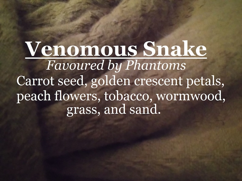 Venomous Snake fragrance, favoured by Phantoms carrot seed, labdanum, peach, tobacco, wormwood, grass, sand image 1