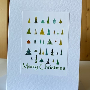 Árvores de Natal Cartões em aquarela feitos à mão um conjunto de cinco cartões de boas festas Personalize com sua própria saudação na frente