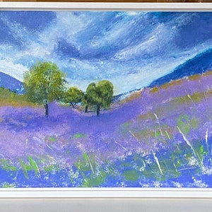 An acrylic painting of a landscape scene. The foreground is a field of purple flowers with green accents. In the mid-ground are green trees and a rolling hill. The background features a blue sky with white clouds and blue mountains.