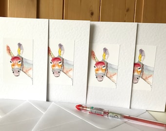 Carte ad acquerello fatte a mano con asino arcobaleno multicolore