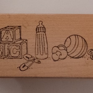 Jouets pour bébés, blocs clés de biberon, tampon en caoutchouc monté sur bois vintage par Art Impressions F-952 1996