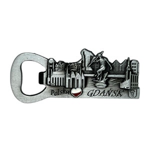 May include: Silver bottle opener with a detailed cityscape of Gdansk, Poland. The opener features a heart with the Polish flag and the text "Polska" and "GDAŃSK".