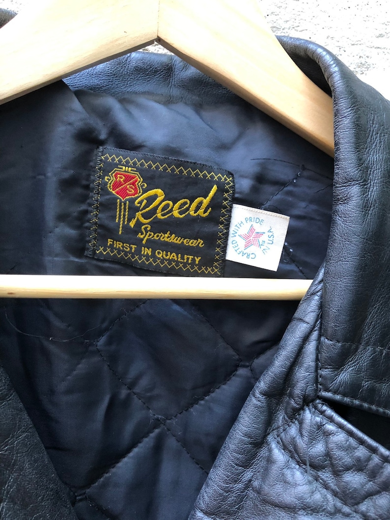 1980s Reed Leather Jacket Made in USA Fringed Leather Sportswear Biker Motorcycle Gang Harley Davidson Patch