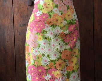 Summer everyday skirt made from 70's repurposed sheets with new cotton lining. Floral print in pink, orange, yellow, pale greens and white.