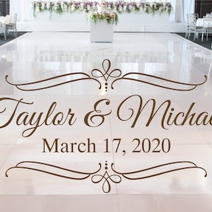May include: A brown decorative floor decal with a stylised design and the text "Taylor & Michael March 17, 2020".