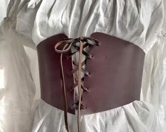 Leather bodice with semiring.