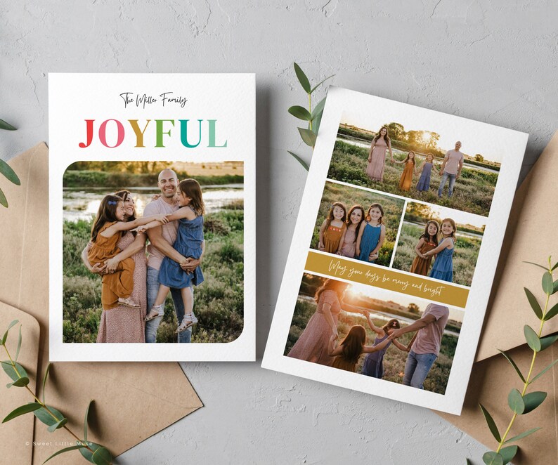 May include: Two white family photo cards. One card has the word "JOYFUL" in rainbow colors. The other card has multiple family photos and the text "May your days be merry and bright".