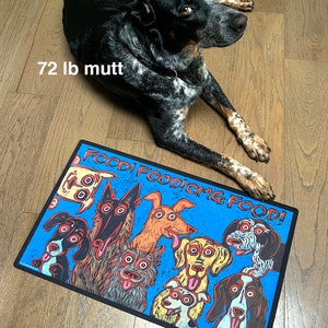 May include: A blue and black dog doormat with the text "Food! Food! OMG Food!" and a cartoon illustration of multiple dogs with their tongues sticking out.