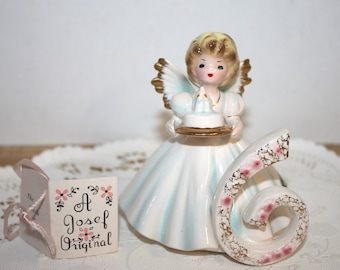 Josef Original Birthday Angel with #6 holding a cake on a gold platter, with orig poem, and paper stickers