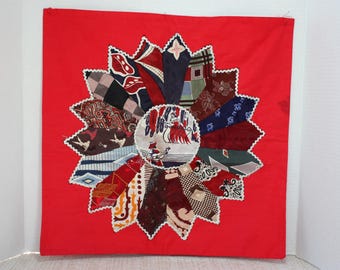 Handmade home made vintage red throw pillow cover with sun/flower design of vintage neckties, silver rick rack, stain/ damage on one petal