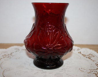 Ruby red glass 5.5" vase with raised flower pattern in the glass