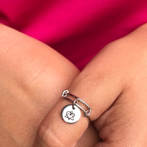 Adoption top symbol ring
