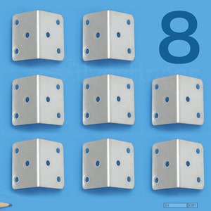 May include: Nine silver-colored corner braces with pre-drilled holes are arranged on a blue background. The number "8" is displayed in blue. A pencil and a ruler with inch and centimeter markings are also present.