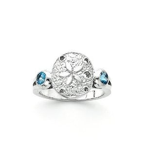 Sterling Silver Sand dollar ring w/ Blue Topaz side stones