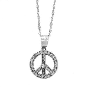 14k solid white gold peace pendant and chain with a diamond. peace pendant