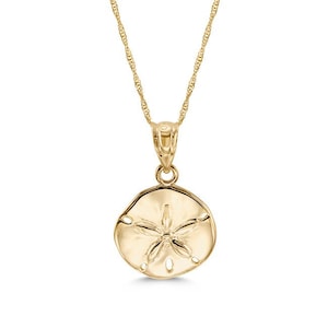 14k solid gold sand dollar pendant on 18" solid gold chain.