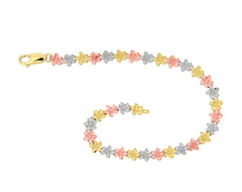 May include: A gold, silver, and rose gold bracelet with a flower design. The bracelet is made of 14k gold and is 7 inches long.