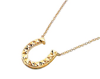14k yellow gold diamond cut horse shoe necklace. good luck necklace.