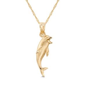 14k solid gold dolphin pendant on 18" solid gold chain.