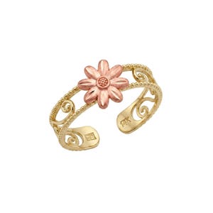 May include: A 14K gold open-style ring featuring a rose gold flower centerpiece with textured petals. The band is crafted from yellow gold with intricate scrollwork and beaded edges. The stamp 14K is visible on the inner side of the band.