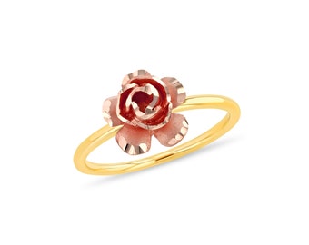 May include: A gold ring with a rose-colored rose design.