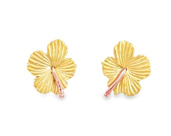May include: A pair of stud earrings shaped like hibiscus flowers. Each earring features a textured yellow gold petal design with a smooth, curved rose gold stamen extending from the center, creating a two-tone metallic floral appearance.