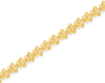 Puede incluir: Un brazalete de cadena de oro con un diseño de flores. Cada eslabón es una pequeña flor detallada.