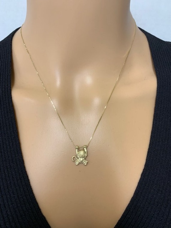 14K Solid Gold Swinging Monkey Pendant Necklace on 18