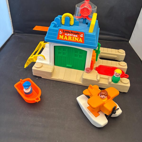Puerto deportivo flotante vintage de Fisher Price Little People con caja original.