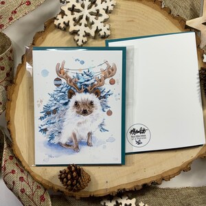 Pack of two greeting cards, hedgehog with fir branches and Christmas decorations. image 2