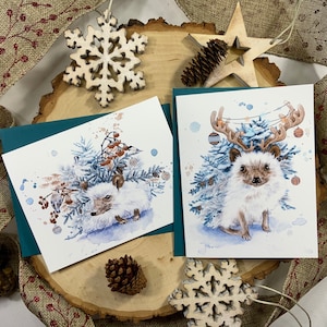 Pack of two greeting cards, hedgehog with fir branches and Christmas decorations. image 4