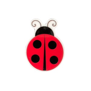 May include: A red ladybug with black spots and white antennae. The ladybug is a cartoon illustration.