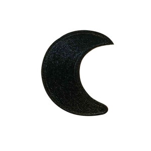 May include: Black felt crescent moon patch. This patch is perfect for adding a touch of whimsy to your clothing, bags, or other accessories.