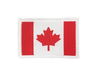 May include: A white embroidered patch with the Canadian flag. The flag features a red maple leaf on a white background with red stripes on either side.