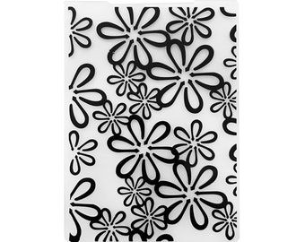 May include: A clear, rectangular plastic folder featuring a repeating pattern of black flower shapes. The flowers have rounded petals and are scattered across the surface. The folder has a smooth, glossy finish.