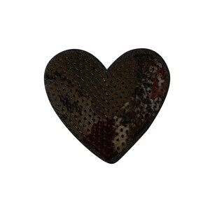 May include: A black heart-shaped patch covered in sequins.