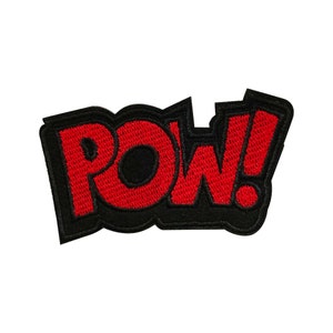 May include: Red embroidered "POW!" patch with black outline. The patch is made of fabric and has a classic comic book style.